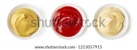 Set of sauces - ketchup, mayonnaise and mustard isolated on white background, top view