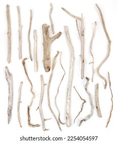 Set of sea driftwood branches isolated on white background. Bleached dry aged drift wood.  - Shutterstock ID 2254054597