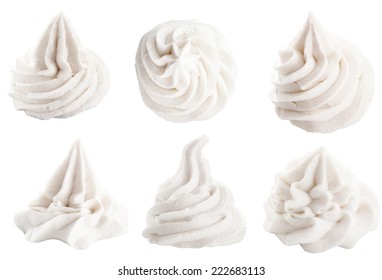 Set of six different white decorative swirling toppings for dessert isolated on white depicting whipped cream, ice cream or frozen yogurt