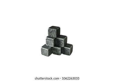 Set Of Six Spirit Chilling Stones On White Background. Soapstone Rocks Are Carved In Pyramid To Be Used As Drink Chiller. Various Type Of Raw Minerals Produces Different Colors Such As Charcoal Black.