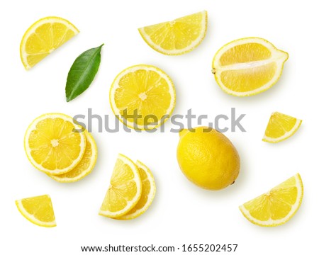 A set of sliced lemon isolated on white background. Top view.