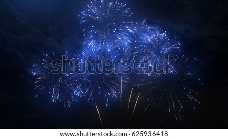 A set of slow motion fireworks on black background, isolated sequence animation without cropping, collage of colorful fireworks exploding in the night sky.