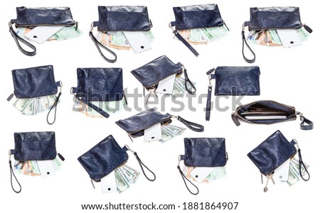 set of small blue leather wristlet pouch bag with contents isolated on white background