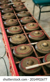 Set Of Small Brass Gongs Called Talempong, A Traditional Music Instrument Of Minangkabau Culture From West Sumatra, Indonesia. No People. Selective Focus. Top View.