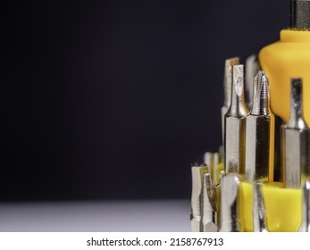 Set Of Small Screwdriver On Black Background. Small Tool Kit.