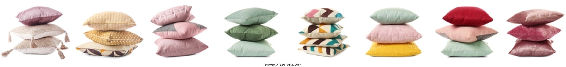 Set of soft cushions on white background