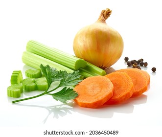 Set of spices for vegetable stock - celery sticks, carrot slices, parsley, onion and black pepper isolated on white background - Shutterstock ID 2036450489