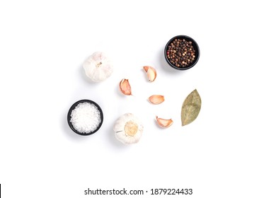 Set Of Spicy Garlic, Salt, Pepper, Bayleaf On White Background. Top View