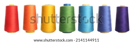 Set with spools of multicolor on white background. Banner design