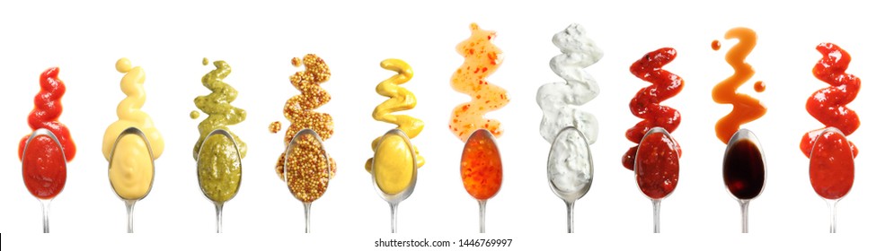 Set of spoons with different delicious sauces on white background, top view - Shutterstock ID 1446769997