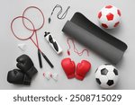 Set of sports equipment on grey background