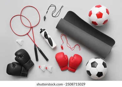 Set of sports equipment on grey background - Powered by Shutterstock