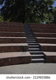 A Set Of Stairs In An Outdoor Amphitheatre