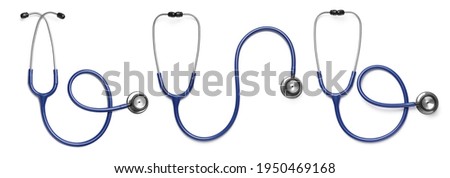 Set with stethoscopes on white background, top view. Banner design