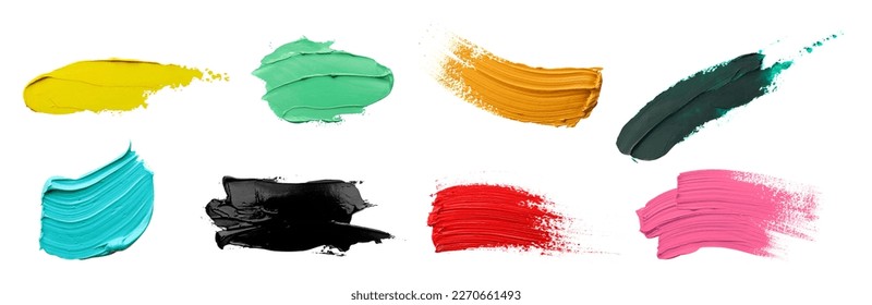 Set with strokes of colorful oil paints on white background, top view