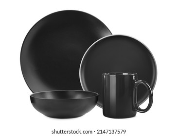 Set of stylish black dinnerware on white background