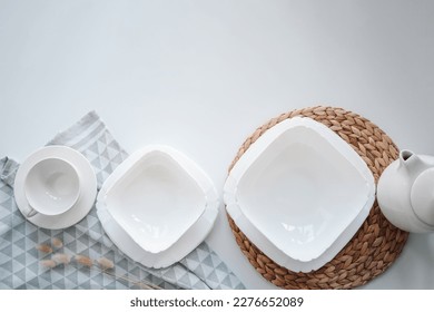 Set of stylish tableware set flat lay top view on white background.