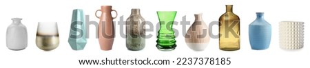 Set of stylish vases on white background