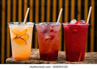 Set Of Summer Lemonades In Plastic Cups For Takeaway, Colourful Lemonade In Transparent Cup, Lemonade To Go Cup With Different Fruits Cocktail