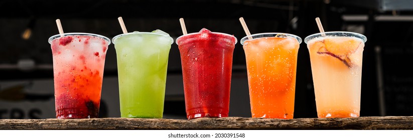 Set Of Summer Lemonades In Plastic Cups For Takeaway, Colourful Lemonade In Transparent Cup, Lemonade To Go Cup With Different Fruits Cocktail