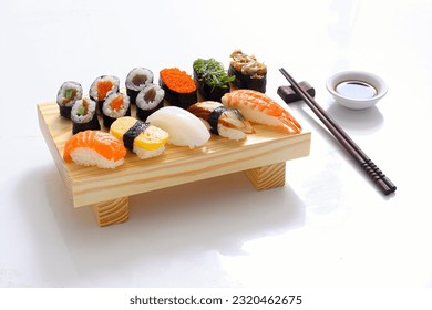 Set of sushi and rolls with a salmon, Japanese food concept.