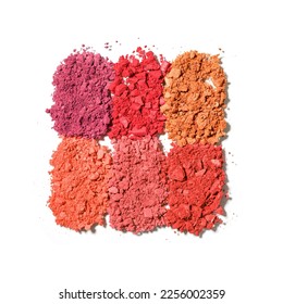 Set swatches beauty product crushed eyeshadows for makeup white background  close up cosmetic textures  eyeshadow crumbs  red orange color gradient  top view eye paints palette  aesthetic pattern
