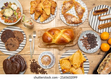 Set Of Sweet Desserts, Cakes And Breakfasts, Croissants With Sugar, Fruits, Salad With Goat Cheese, Brioche Bread, Apple Pie And Chocolate Palmspalms