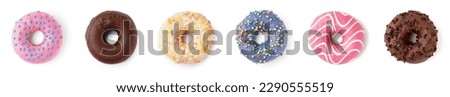 Set of sweet donuts on white background, top view