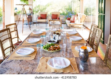 Set The Table Before The Lunch In Veranda Of The Spanish Home, Mallorca