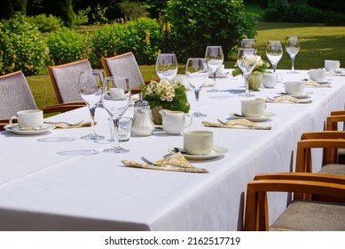 A Set Table Outside In Nature. Hotel Restaurant.