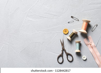 Set Of Tailoring Accessories On Grey Background, Top View