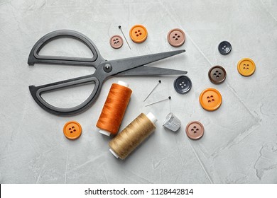 Set Of Tailoring Accessories On Light Background, Top View