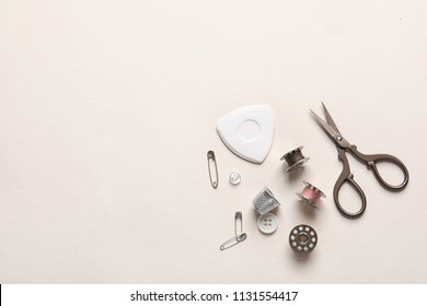 Set Of Tailoring Accessories On Light Background, Top View