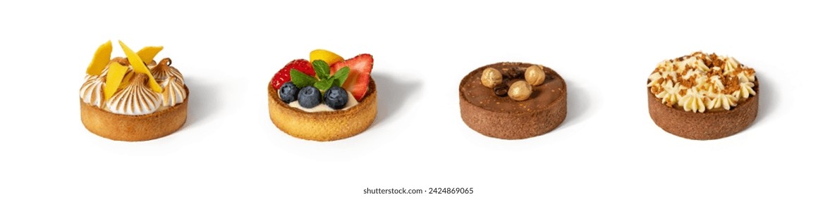 Set of tartlets with whipped cream, berries, chocolate and nuts on white background. Candy bar, sweets and dessert
