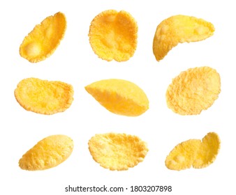 Set of tasty crispy corn flakes on white background