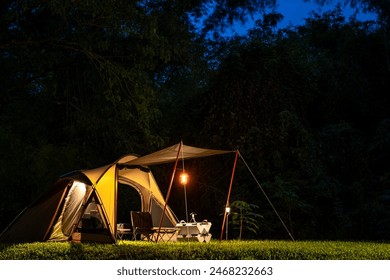 Set up a tent in the dusk at campground - Powered by Shutterstock