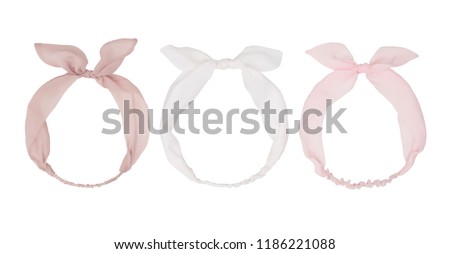 Set of three children hair bands of different colors, with bows, clipping, isolated on white background