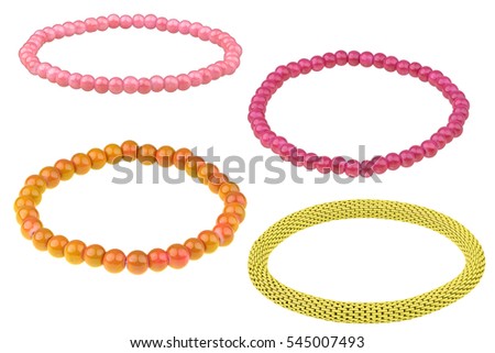 Set of three elastic bracelets made of pearl-like round beads (pink, purple and orange) and one yellow metallic elastic bracelet, isolated on white background, clipping path included