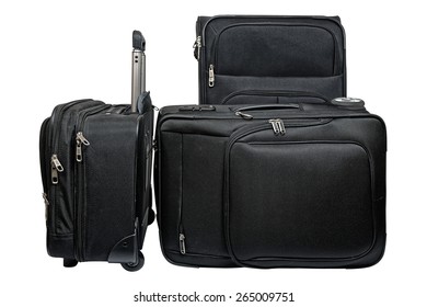 Set Of Three Matching Black Suitcases Of Different Sizes With Telescoping Metal Handles And Wheels Made From A Black Ballistic Nylon