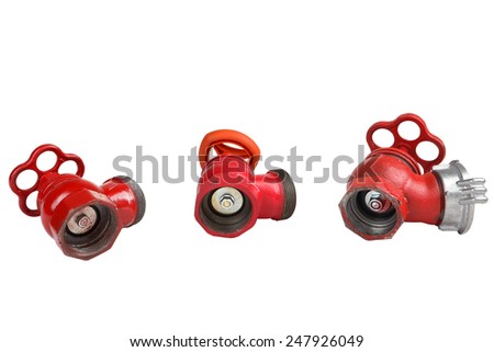 Set of three red, cast-iron fire valve to regulate the water pressure in the fire hose, an external thread for the connection of a fire hose, fire hydrants for location indoors, isolated on white.