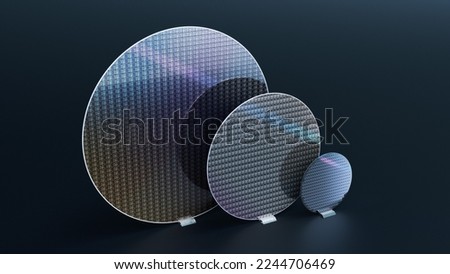Set of Three Silicon Wafers of Different Sizes, 300mm, 200mm and 100mm, on Dark Background