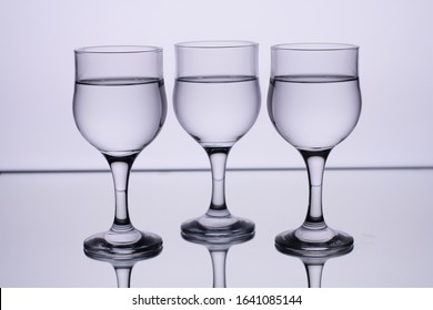 Set Of Three  Water Glasses In Black And White.