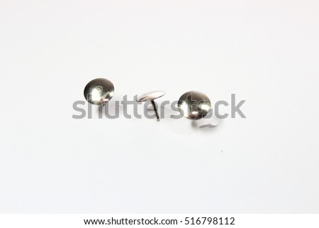 Set of thumbtacks or push pins in different positions, isolated on white background