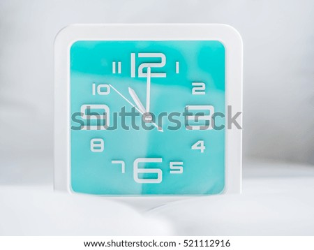 Set of time. 11 O'Clock, Square turquoise clock.