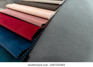  set of tissue fabric samples of different colors for new sofa. Material for furniture and interior 