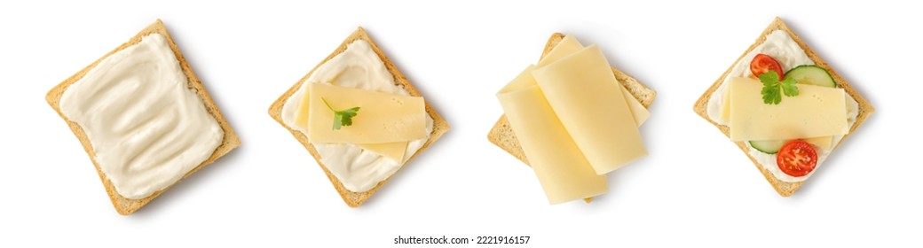 Set of toasts with melted and sliced cheese on bread. Assortment of sandwiches with gouda cheese, tomatoes, cucumber isolated on a white background with clipping path. Top view. - Shutterstock ID 2221916157