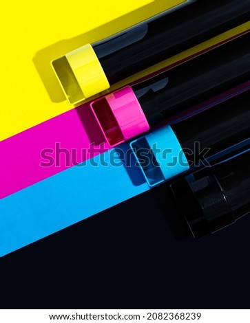 A set of toner cartridges for a color laser printer on the background of SMYK. bright creative concept minimal. 