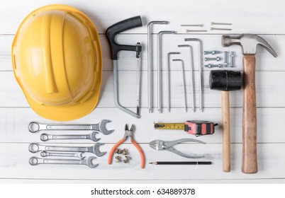 Set Of Tools Supplies On Wood Background Top View. Construction Industry Flat Lay Concept