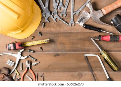 Set Of Tools Supplies On Wood Background Top View And Copy Space. Construction Industry Flat Lay Concept