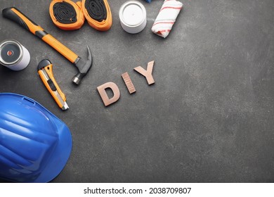 Set Of Tools And Word DIY On Dark Background